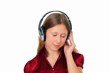 Fototapeta premium a teenage girl in studio with headphones