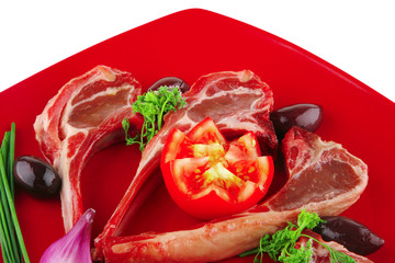image of ribs served on red