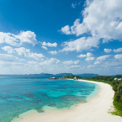 Tropical beach, clear blue water and coral reef, Okinawa, Japan