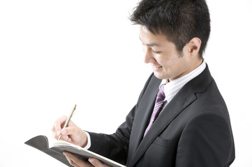 メモをとるビジネスマン