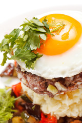 beef burger with egg and potatoes