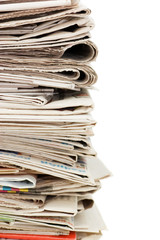 Various newspapers over white background
