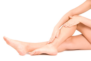 Female feet isolated on white background