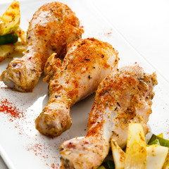 Roasted chicken drumsticks and vegetables