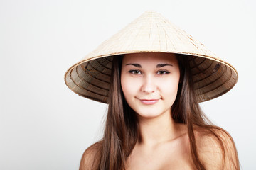 Girl in vietnamese hat