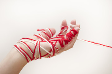 Traditional Bulgarian Martenitsa on Caucasian Hand