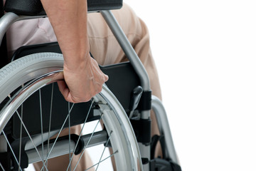hand on wheelchair