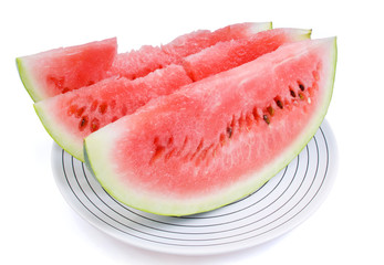 Three portions of red water-melon on white plate