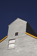 Gray and gold Tuxford grain elevator