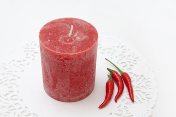 candle and peppers