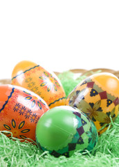 Colorful Easter Eggs on green Grass