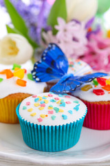 Easter cupcakes with spring flowers