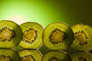 Green Kiwi in row