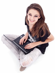 Naklejka premium Girl working with laptop. Picture on a white background.