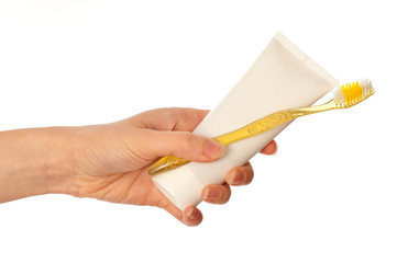 Toothpaste and blue toothbrush