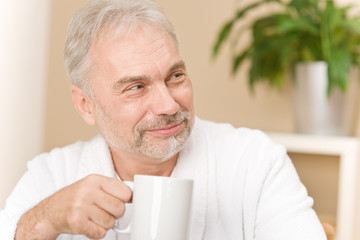 Senior mature man - breakfast coffee at home