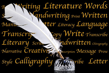 Quill pen and inkwell on black background
