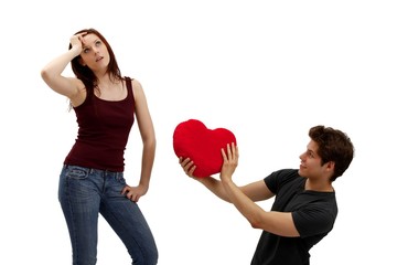 young couple with a heart (white background)