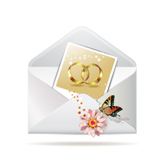 Envelope with photo of  two wedding ring