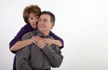 Playful Middle-Aged Couple Smiling