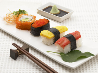 Mix sushi on table top.