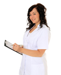 Krankenpflegerin notiert etwas