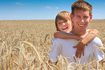 Happy brothers in corn field