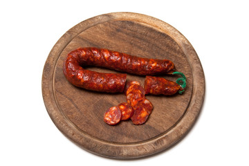 Spanish Chiriso sausage isolated on a white studio background.