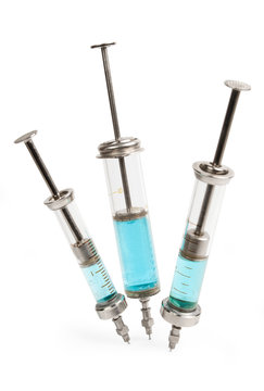 Syringes with blue medicine