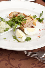 meat pie with egg and sauce