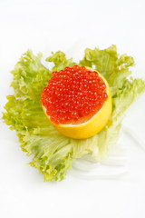Caviar served on fresh lemon