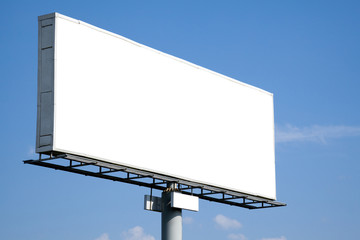 Blank billboard against blue sky