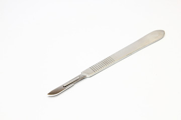 Scalpel over white background