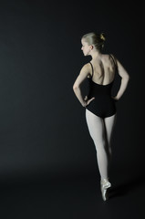 Ballet dancer with dark background