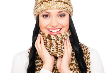 laughing young woman in hat and scarf