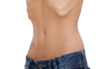 Naklejka premium Belly of young female with anorexia