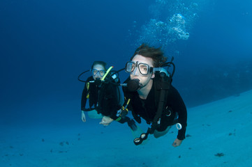 scuba divers having fun