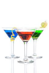 Three tropical Martini Cocktails drink red blue green