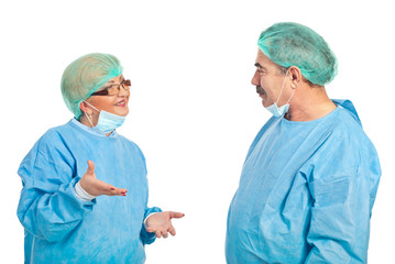 Middle aged surgeons having conversation