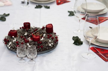 Elegant christmas table with plates and glasses