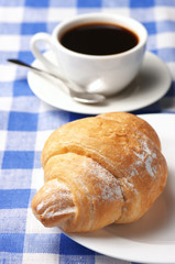 Croissant and black coffee