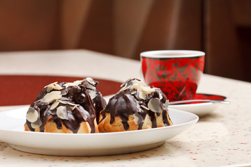 chocolate eclairs with coffee