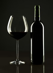 Wine bottle and glass