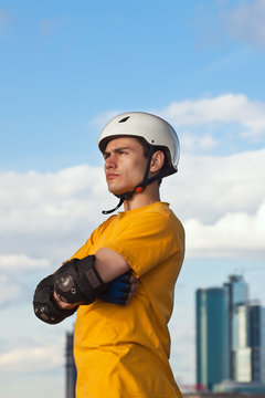 young man in helmet and protective gear