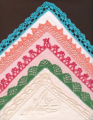 hand-made laces and embroidery on cotton handkerchieves