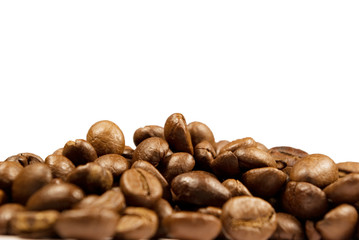 An arrangement of coffee beans on a white background