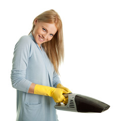Cheerful woman with handheld vacuum cleaner © Andrey Popov