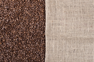 Coffee background with beans and a canvas