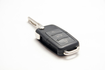 car flip key remote with open blade on white