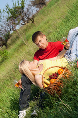 Pretty blonde and young man with wineglasses